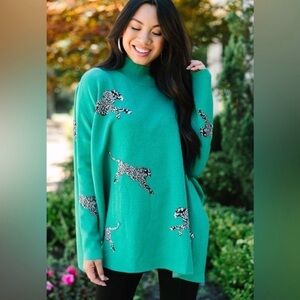 Shop the Mint Quick Decisions kelly green cheetah sweater